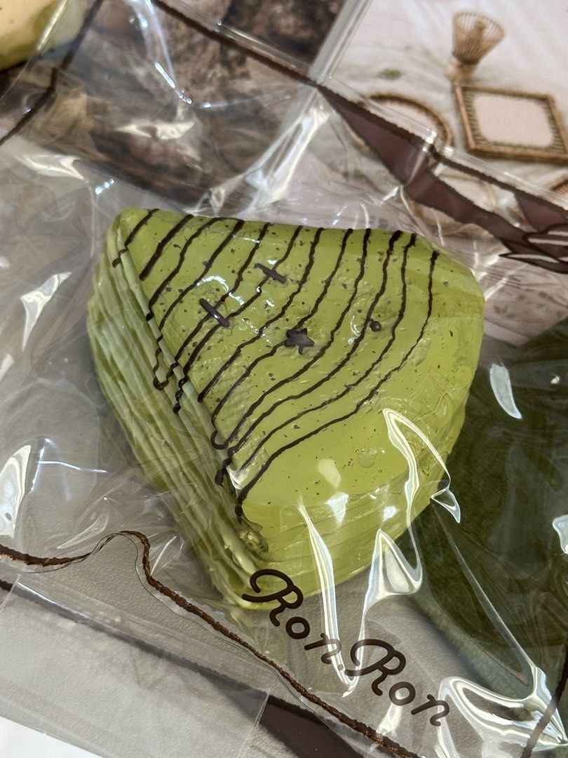Ronron Matcha Nap | Matcha Mille-Crepe Cake (Category: Homemade Bakes) located in Tagbilaran City. Submitted by _harriet_ (Listing ID 1461063902, Image 2). Description: Texture: Creamy Clay-like | Soft/Smooth Creamy Studio: Ronron Matcha Nap | Matcha Mille-Crepe Cake Comes with: ♡ Collection card ♡ One replacement bag ♡ Collectible drawstring pouch ♡ Limited edition sticker with matching design ♡ Location: Bohol ♡ MOD: J&T (Shipping fee is ₱85) ♡