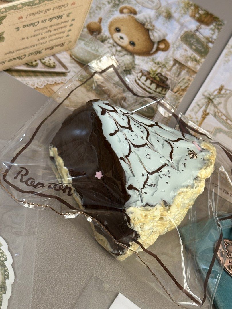 Ronron Mint Choco | Mint Chocolate Latte Art Slice (Category: Homemade Bakes) located in Tagbilaran City. Submitted by _harriet_ (Listing ID 1461066598, Image 1). Description: Ronron Mint Choco | Mint Chocolate Latte Art Slice Texture: Milky Muddy Comes with: ♡ Collection card ♡ One replacement bag ♡ Collectible drawstring pouch ♡ Limited edition sticker with matching design ♡ Location: Bohol ♡ MOD: J&T (Shipping fee is ₱85) ♡ MOP: Gcash | Maya |