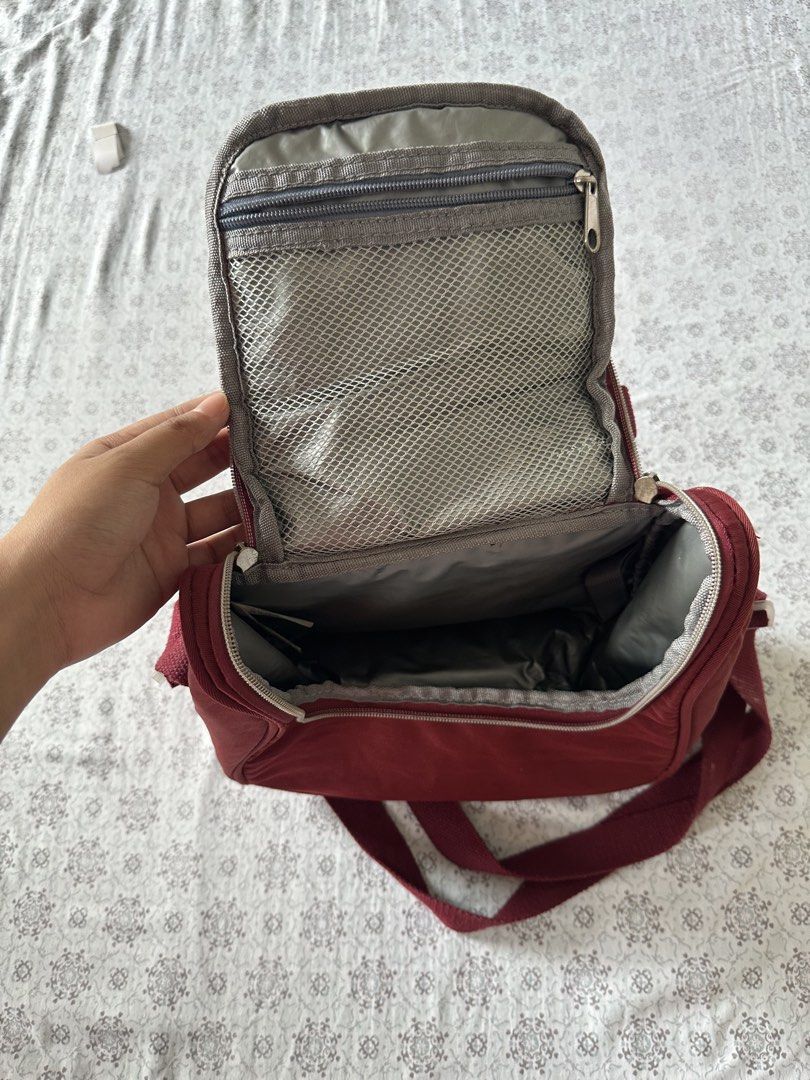 Ruffles Thermal Insulated Lunch Bag Maroon (Category: Purses & Pouches) located in Quezon City. Submitted by 4k_cam (Listing ID 1460961352, Image 3). Description: - Maroon Ruffles insulated lunch bag - Main compartment for food storage - Zippered mesh pocket inside top flap for small items - Includes an adjustable shoulder strap for easy carrying - Versatile for use as a lunch bag or cosmetic travel bag - Zippers are in excellent working conditio