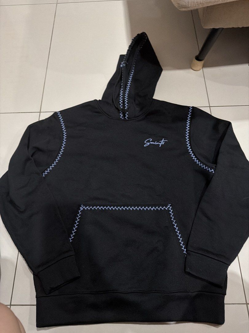Saints Studio Black Hoodie Size S (Category: Hoodies) located in Rizal. Submitted by macristina33105 (Listing ID 1461031568, Image 1). Description: - Saints Studio Black Hoodie - Size: S - Contrast stitching on hood, sleeves, and pocket - Simple logo on chest - Comfortable and stylish design.