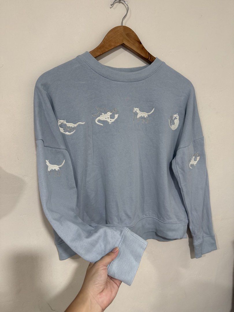 Salad Cats Baby Blue Sweater (Category: Coats, Jackets and Outerwear) located in Manila. Submitted by morningthrifters (Listing ID 1460933949, Image 3). Description: Baby Blue Cats Sweater From Salad Can fits S-M Super cute.