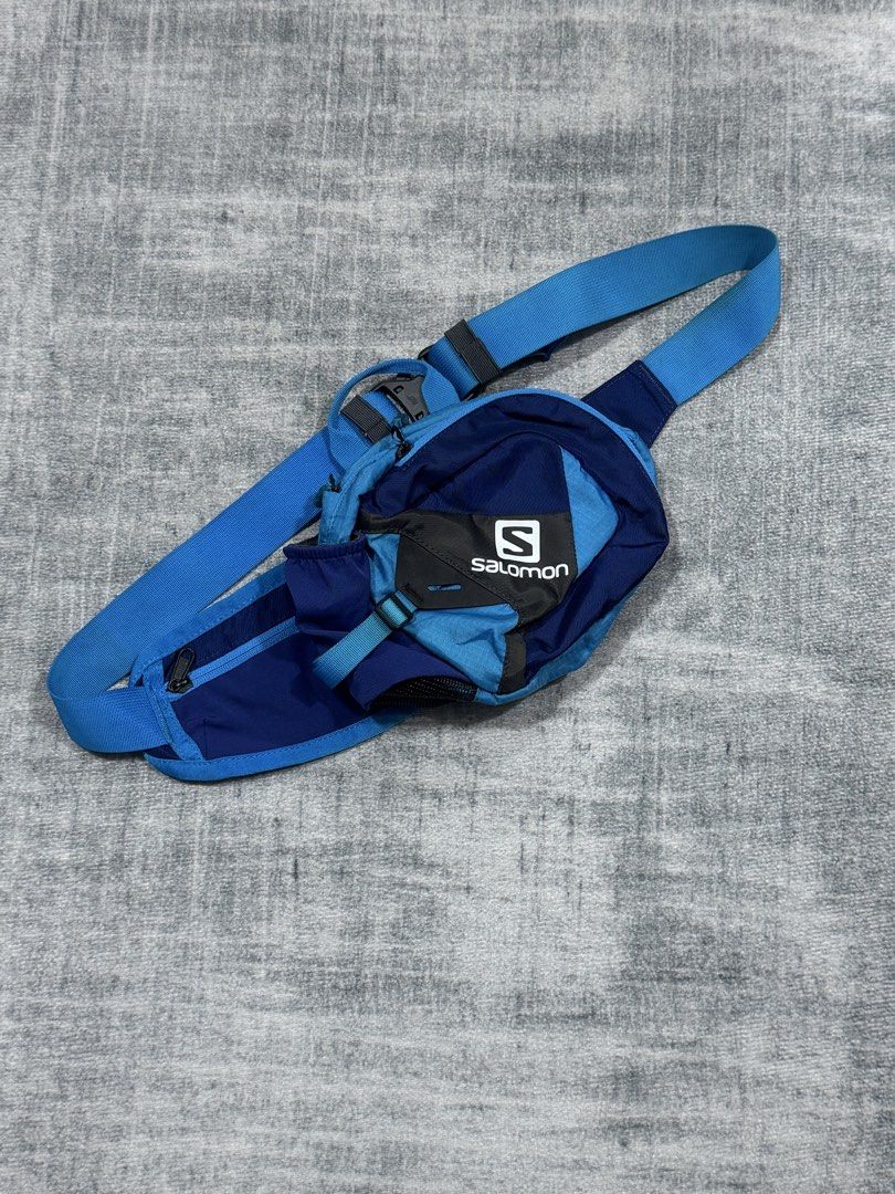 Salomon - Hydration Waist Belt Bag (Category: Belt bags, Clutches and Pouches) located in Manila. Submitted by members-only (Listing ID 1461078511, Image 3). Description: Salomon Hydration Waist Belt Bag Can also worn as shoulder bag Adjustable strap In good condition No major flaws Slight issue in puller (check pics) Authentic & Presentable.