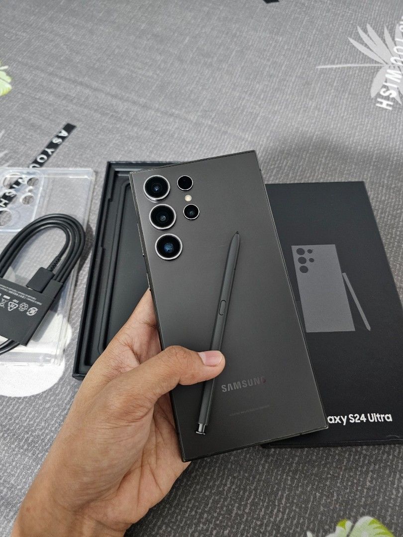 Samsung S24 Ultra - 512gb (Category: Other Mobile & Gadget Accessories) located in Tuguegarao City. Submitted by erika_ja (Listing ID 1460928236, Image 2). Description: Samsung S24 Ultra 12gb | 512gb - with box, clear case and cable charger - working spen, no issue, never been repaired or opened - single sim + e-sim (pwede kahit anong simcard, no restrictions) - can ship via LBC COD or COP ( but required atleast 2k dp, then balance to be paid on 