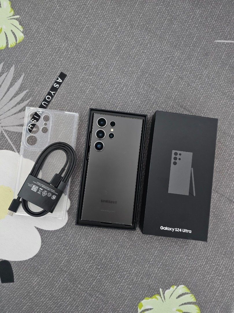 Samsung S24 Ultra - 512gb (Category: Other Mobile & Gadget Accessories) located in Tuguegarao City. Submitted by erika_ja (Listing ID 1460928236, Image 1). Description: Samsung S24 Ultra 12gb | 512gb - with box, clear case and cable charger - working spen, no issue, never been repaired or opened - single sim + e-sim (pwede kahit anong simcard, no restrictions) - can ship via LBC COD or COP ( but required atleast 2k dp, then balance to be paid on 