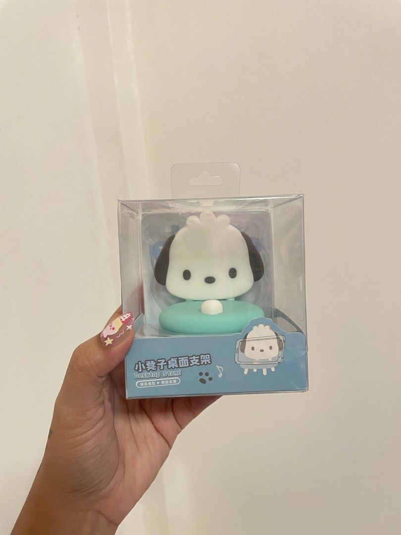Sanrio Characters Pochacco Desktop Stand (Category: Character Goods) located in Iba. Submitted by wealtheallymari99 (Listing ID 1461084150, Image 1). Description: - Adorable Pochacco design - Perfect for holding phones and small desk items - Brand new in original packaging - Ideal gift for Sanrio collectors and fans.