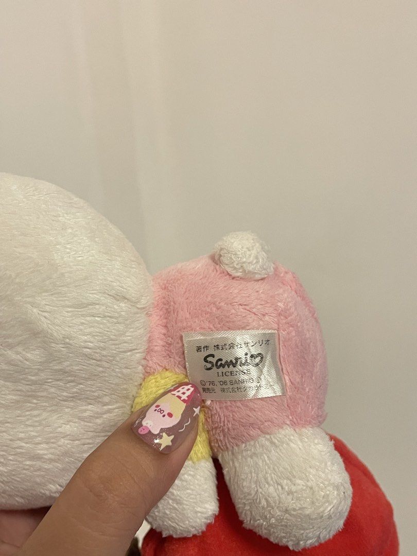 Sanrio Hello Kitty Plush with Apple (Category: Plushies & Soft Toys) located in Iba. Submitted by wealtheallymari99 (Listing ID 1461085268, Image 3). Description: - Adorable Kitty plush toy - Comes with a red apple featuring 'KT' embroidery - Authentic Sanrio product - Ideal for Kitty collectors - Makes a wonderful gift - Small and huggable size.