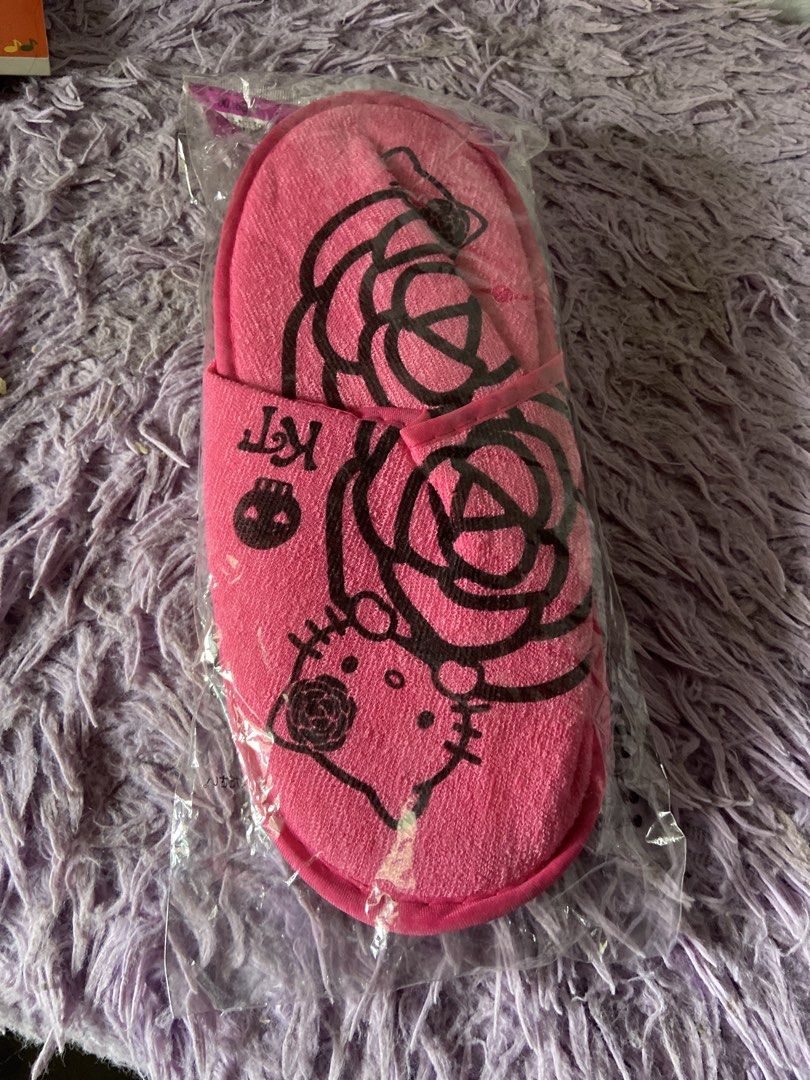 Sanrio Hello Kitty Slippers - Black & Pink (Category: Slippers and slides) located in Davao. Submitted by mengsmixitems (Listing ID 1461053082, Image 3). Description: - Soft and cozy indoor slippers - Available in two adorable designs: Black with white Kitty logo OR Pink with large rose and Kitty - Perfect gift for any Sanrio or Kitty enthusias -fit to size 6 /7.