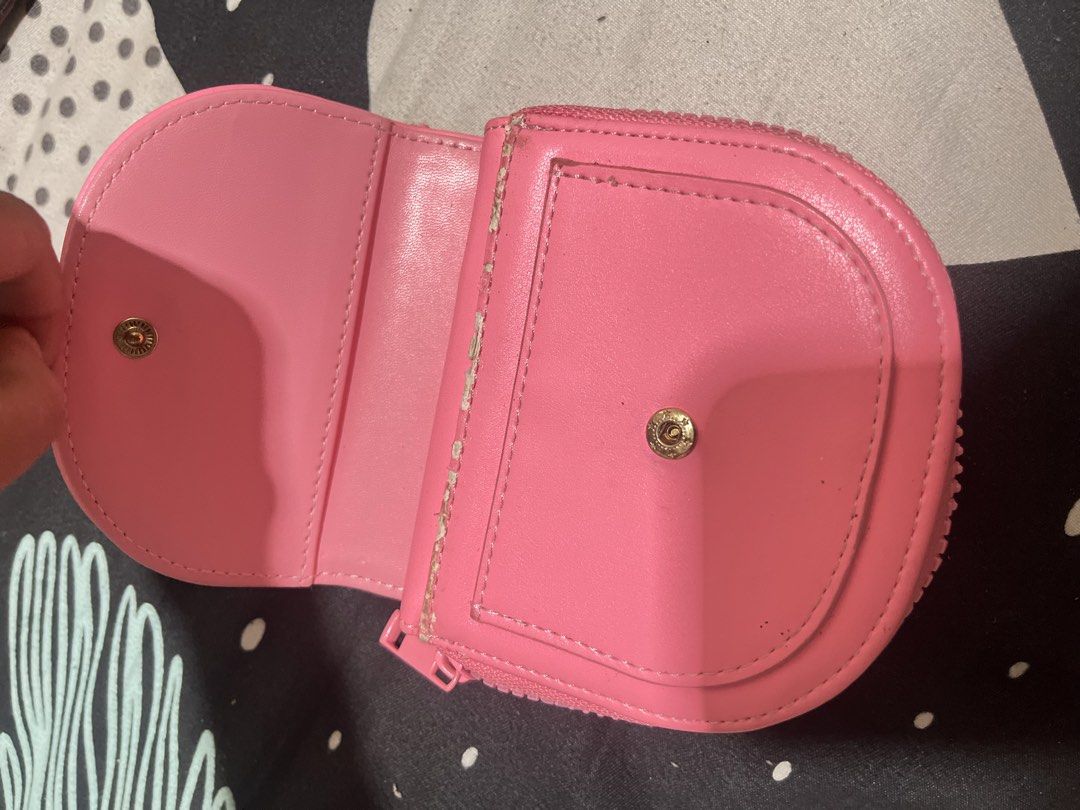 Secosana Cosmetic Bag & Wallet (Category: Purses & Pouches) located in Naga. Submitted by Carmel_C (Listing ID 1461076689, Image 3). Description: - Secosana Black Cosmetic Bag: Zippered closure, clean interior. - Secosana Pink Coin Pouch: Snap closure, zippered compartment. - Both ideal for organizing your essentials. - Pink pouch shows minor signs of wear; both in good overall condition. - Perfect for travel or everyday use..