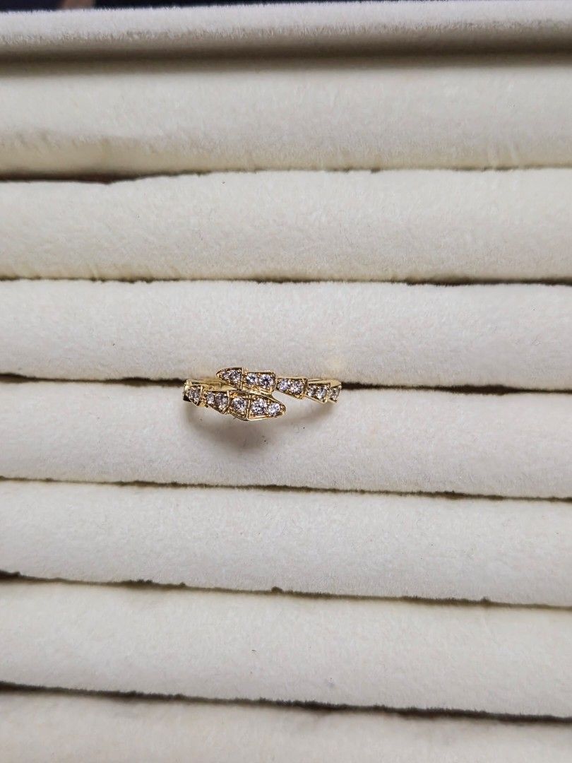 Serpentine Ring (Category: Rings) located in Marikina City. Submitted by 000christina000 (Listing ID 1460943332, Image 1). Description: 0.50ct natural diamond 18k gold setting Size 8 comes with lab certificate.