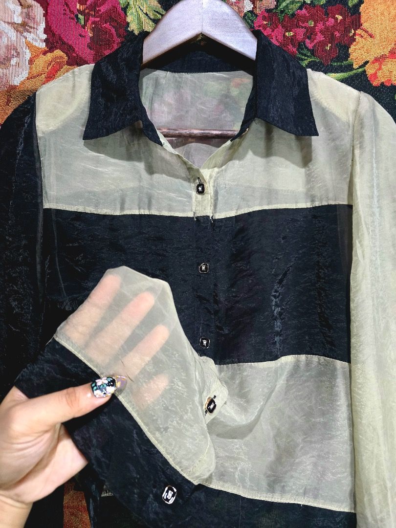 Sheer Striped Longsleeves (Category: Longsleeves) located in Paranaque City. Submitted by titaartestudio (Listing ID 1461098662, Image 2). Description: - Cool sheer jacket - Black and beige stripes - Long sleeves with button cuffs - Ideal for layering over tops - Unique and stylish design.