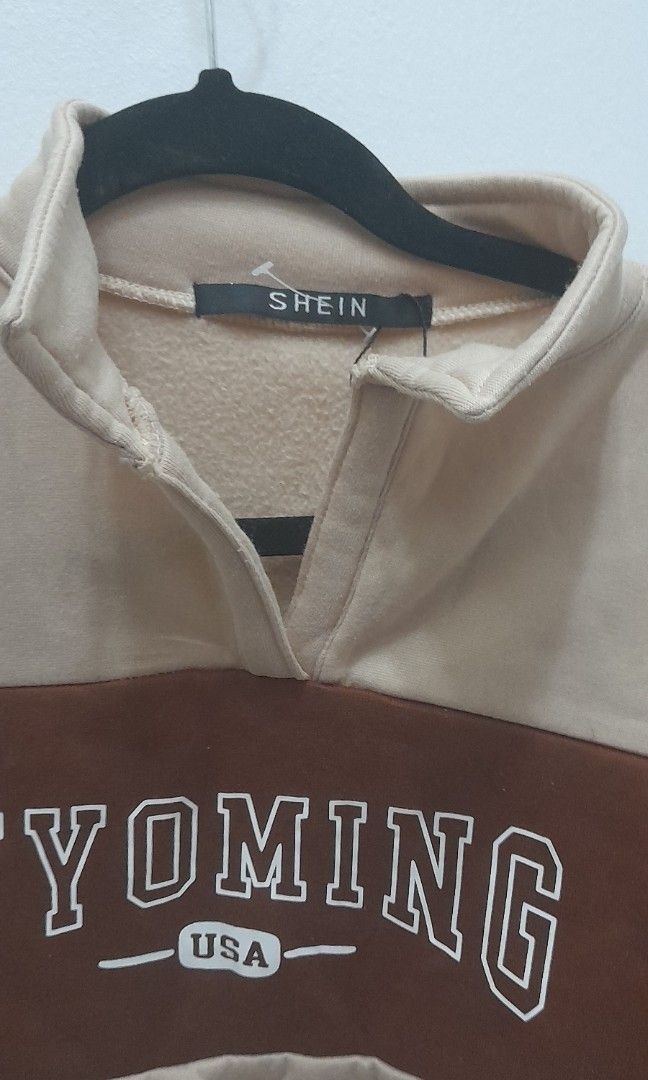 SHEIN BROWN CROP TOP SWEATSHIRT (Category: Coats, Jackets and Outerwear) located in Mandaluyong City. Submitted by .prelovedbymitch (Listing ID 1460954537, Image 2). Description: never worn masikip sakin W21xL16.