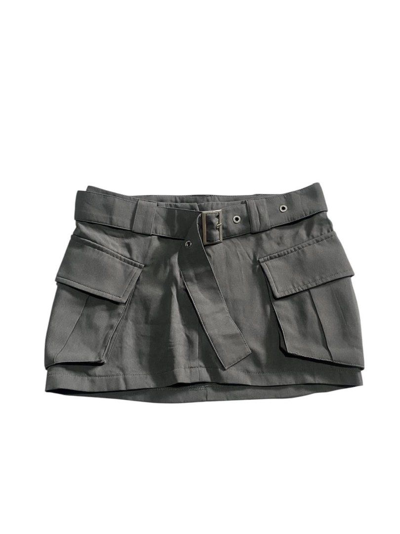 SHEIN Grey Cargo Belted Mini Skirt (Category: Skirts) located in Manila. Submitted by stormibutterfly26 (Listing ID 1461083375, Image 1). Description: SHEIN Skort grey cargo mini skirt, Size S-M Features a matching belt, buckle, and multiple front pockets. Perfect for casual or edgy outfits..