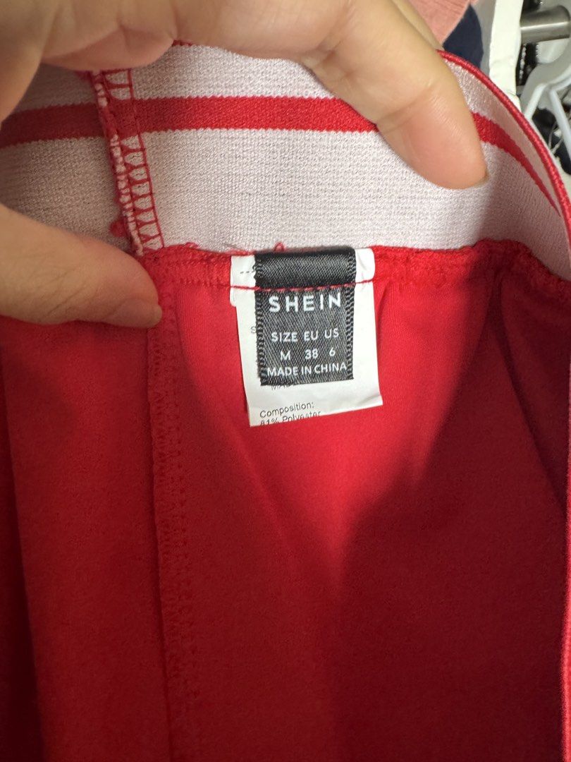 Tennis skirt (Category: Skirts) located in Quezon City. Submitted by AnjRawa (Listing ID 1460960848, Image 2). Description: - SHEIN Red Pleated Mini Skirt - Elastic waistband with "GYM WORK" text - Fun and sporty vibe - Ideal for casual wear or themed outfits - Versatile and easy to style with tops and sneakers.