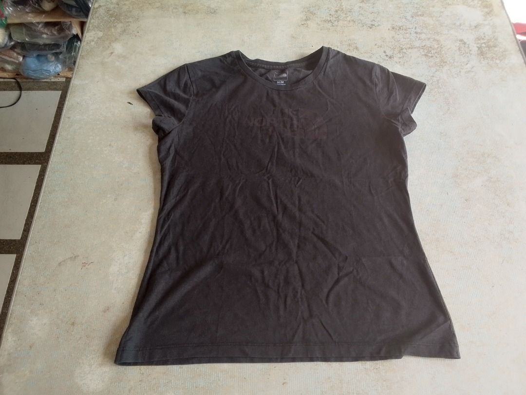 Shirt US The North Face (Category: Activewear) located in Los Banos. Submitted by mania-62906 (Listing ID 1461006796, Image 1). Description: Authentic. US Medium Black. Logo subdued yet still visible at close distance. ( Shorts and shirt TNF for 200 php plus Free tops TNF black see photos).