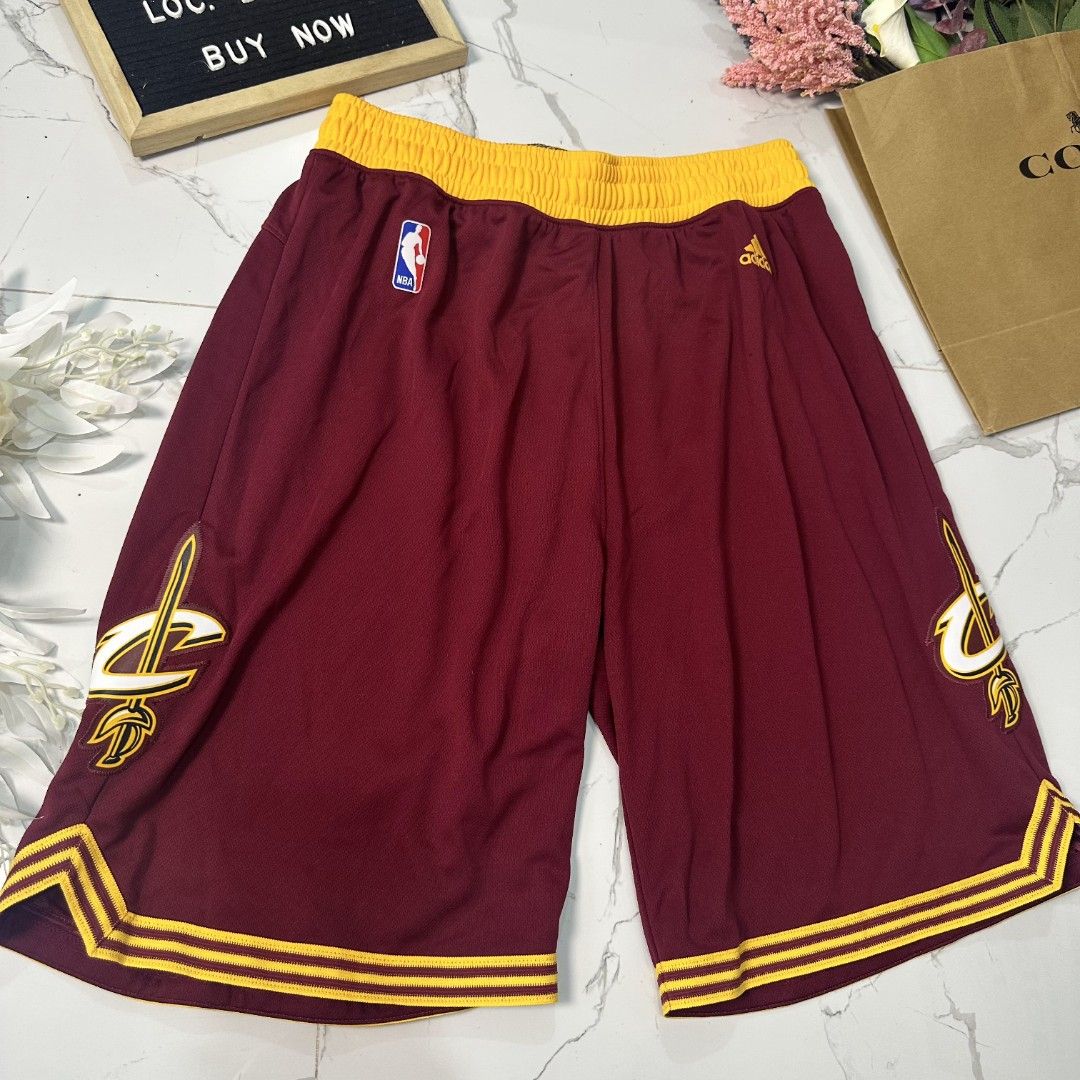 Shortpants (Category: Men's Grooming) located in Baguio. Submitted by kayeonlineshop (Listing ID 1460984258, Image 2). Description: maroon Adidas Cleveland Cavaliers basketball shorts featuring a bright yellow waistband and the team's signature sword logo on the leg NBA L32 W30-40 leghole 27.5.