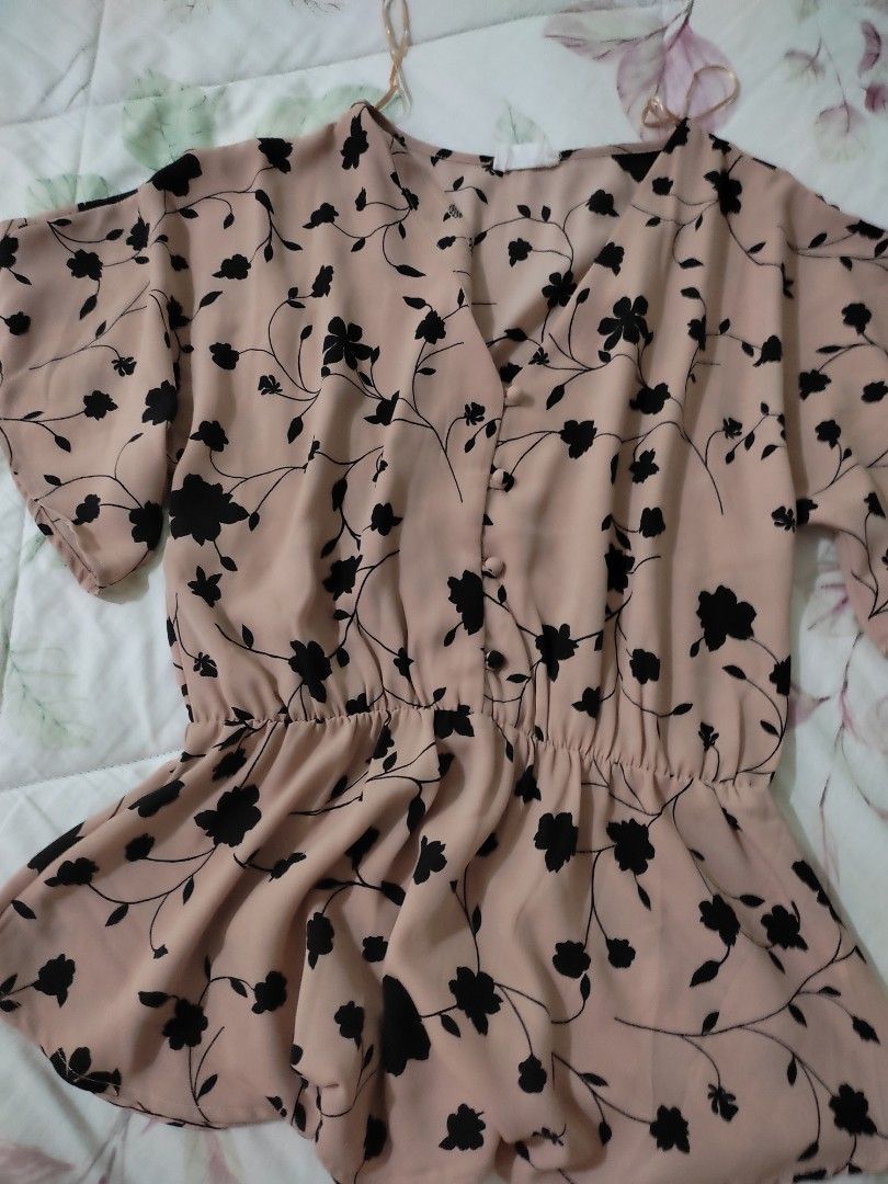 Sienna Sky Pink Floral Top Size S (Category: Others Tops) located in Tarlac. Submitted by momma02 (Listing ID 1460979282, Image 1). Description: - Pink top with elegant black floral print - Short sleeves with a stylish flutter effect - Functional button detail down the front - Flattering shirring detail on the sides - Made from comfortable 100% polyester - Brand: Sienna Sky - Size: S new, unused, tags removed.