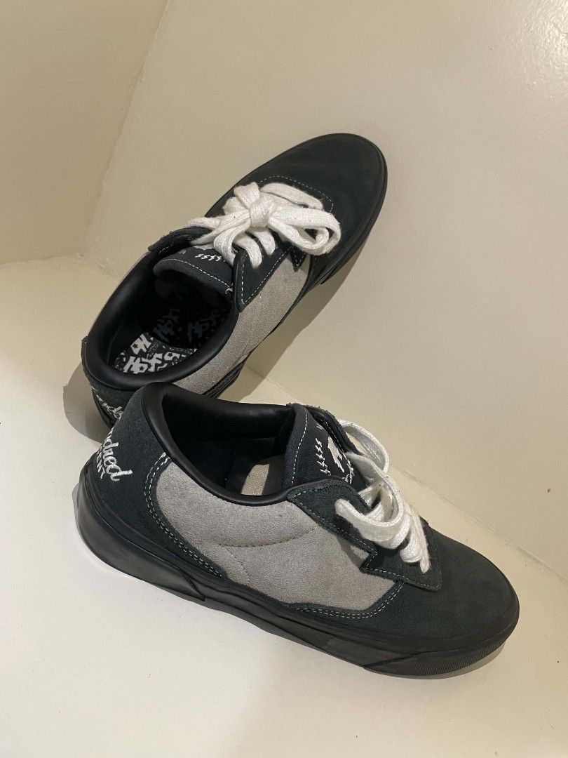 Skateboarding Shoes (Category: Sneakers) located in Manila. Submitted by westcold (Listing ID 1461036006, Image 1). Description: - Classic black and grey Vans skate shoes - Features crisp white laces - Subtle text detail on inner sole and heel - Ideal for skateboarding or casual wear.