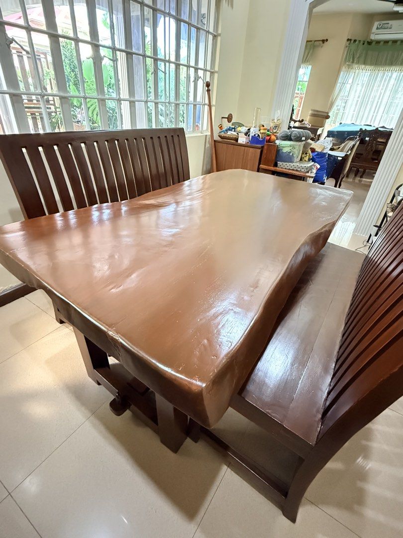 Solid plank Acacia Dining Table with 8 seater capacity chair (Category: Tables & Sets) located in Manila. Submitted by sandiegogvm (Listing ID 1460966094, Image 3). Description: Solid plank Acacia Dining Table with solid and very sturdy wood base supported by steel bolt and nut With contoured surface.