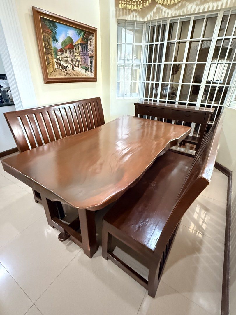 Solid plank Acacia Dining Table with 8 seater capacity chair (Category: Tables & Sets) located in Manila. Submitted by sandiegogvm (Listing ID 1460966094, Image 2). Description: Solid plank Acacia Dining Table with solid and very sturdy wood base supported by steel bolt and nut With contoured surface.