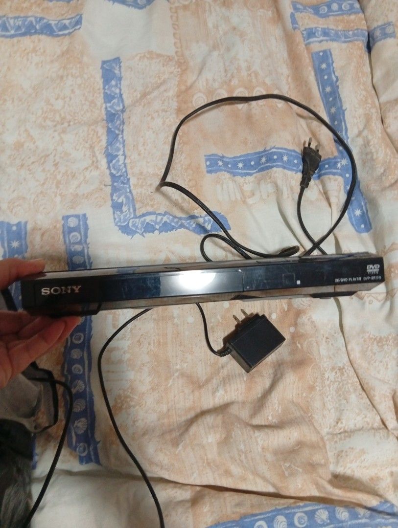 Sony DVD CD Player DVP-SR150 (Category: CDs & DVDs) located in Manila. Submitted by queened10 (Listing ID 1461042874, Image 1). Description: - Sony DVP-SR150 DVD/CD Player - Tested and confirmed working - Includes original power adapter and cable - Compact design, perfect for any space - Ideal for enjoying your DVD movies and music CDs.