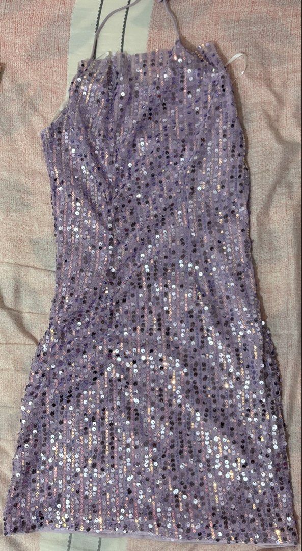 Sparkly Lavender Halter Sequin Mini Dress (Category: Dresses) located in Pasig City. Submitted by juliexxxx (Listing ID 1460991427, Image 1). Description: Can fit xxs-s. double lining mini dress. Perfect for occasions! used only once. Selling it for a low price na lang 🤍 Loc: Ortigas Pasig.