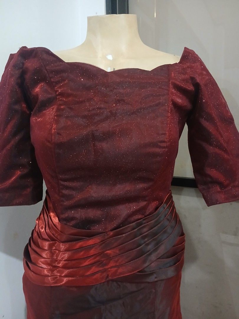 Sparkly Red Long Sleeve Evening Gown (Category: Evening dresses & gowns) located in Abucay. Submitted by mimasshop (Listing ID 1461114604, Image 3). Description: - Beautiful sparkly red evening gown - Long sleeves with shimmering fabric - Subtle glitter details on the bodice - Flattering ruching around the waist - Floor-length design - Ideal for formal events and parties.