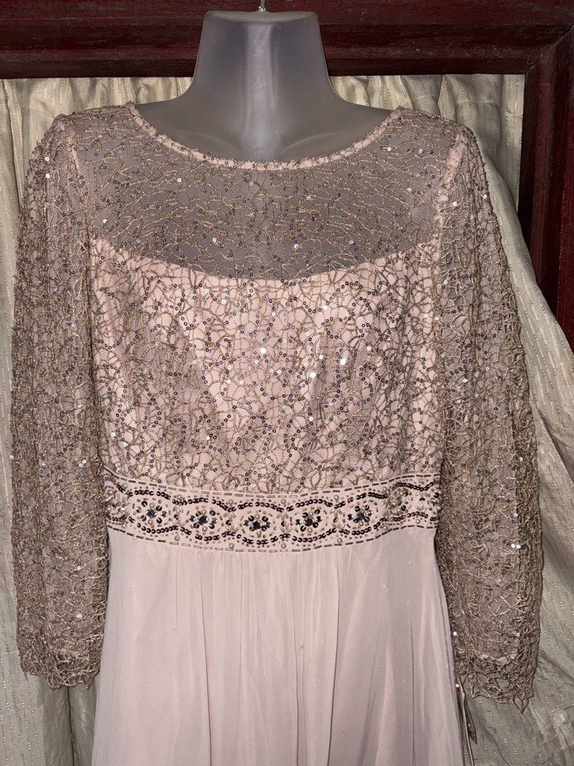 Sparkly Sequin Long Sleeve Maxi Dress (Category: Dresses) located in Manila. Submitted by thriftwithbarbi (Listing ID 1460978902, Image 1). Description: - Elegant long sleeve maxi dress - Intricate sequin and beading on the bodice - Sheer sleeves with matching sequin details - Flowy, lightweight skirt for graceful movement - Zipper closure at the back - Ideal for formal events, parties, and special occasions.