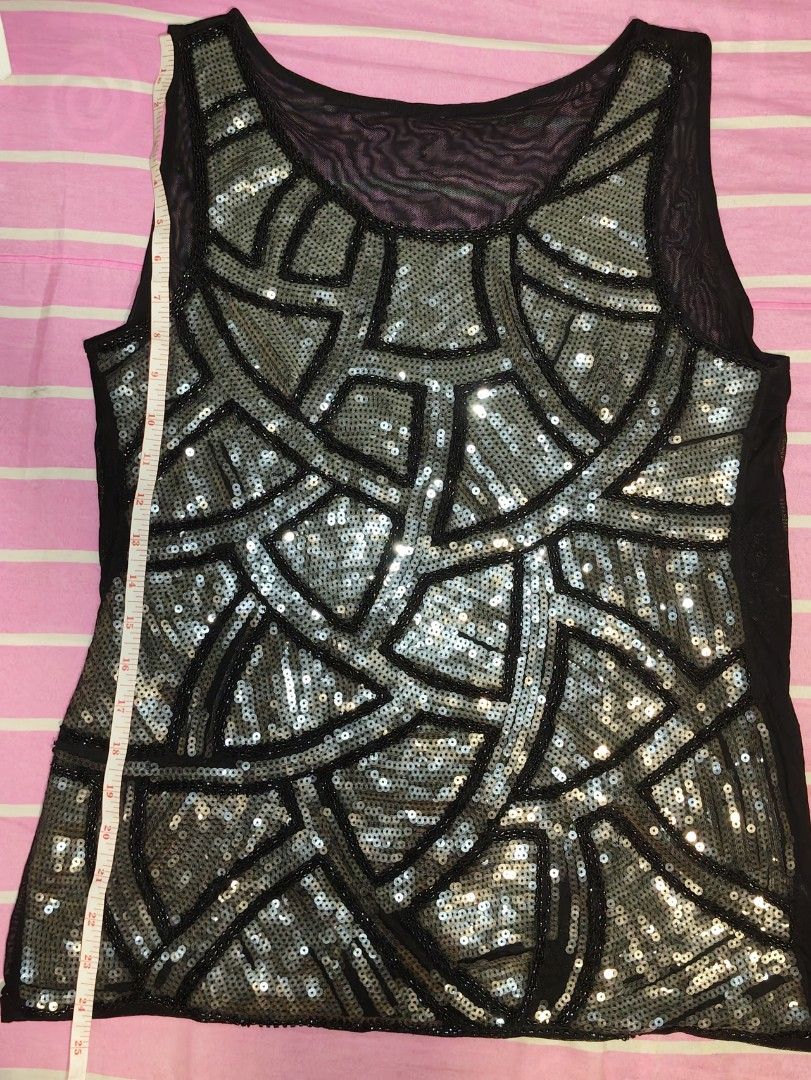 Sparkly Sequin Mesh Sleeveless Top (Category: Sleeveless) located in Manila. Submitted by pink_orchidd (Listing ID 1461092424, Image 3). Description: - geometric silver sequin pattern - natanggal na few sequins pero hindi halata MOP: Cash, Maribank, Gotyme.