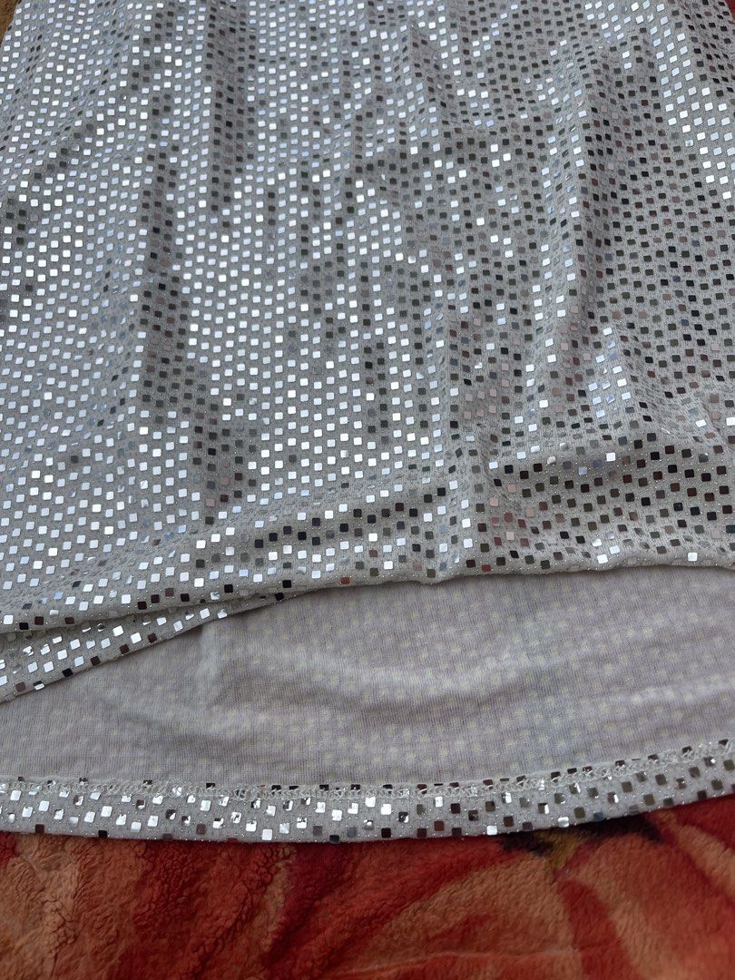 Sparkly Silver Sequin Halter Neck Dress (Category: Dresses) located in Manila. Submitted by aikyy_ (Listing ID 1460922485, Image 2). Description: - Dazzling silver dress covered in sequins - Chic halter neck with thin straps - Unique, slightly uneven hemline - Ideal for parties, events, or a night out - Guaranteed to make you shine!.