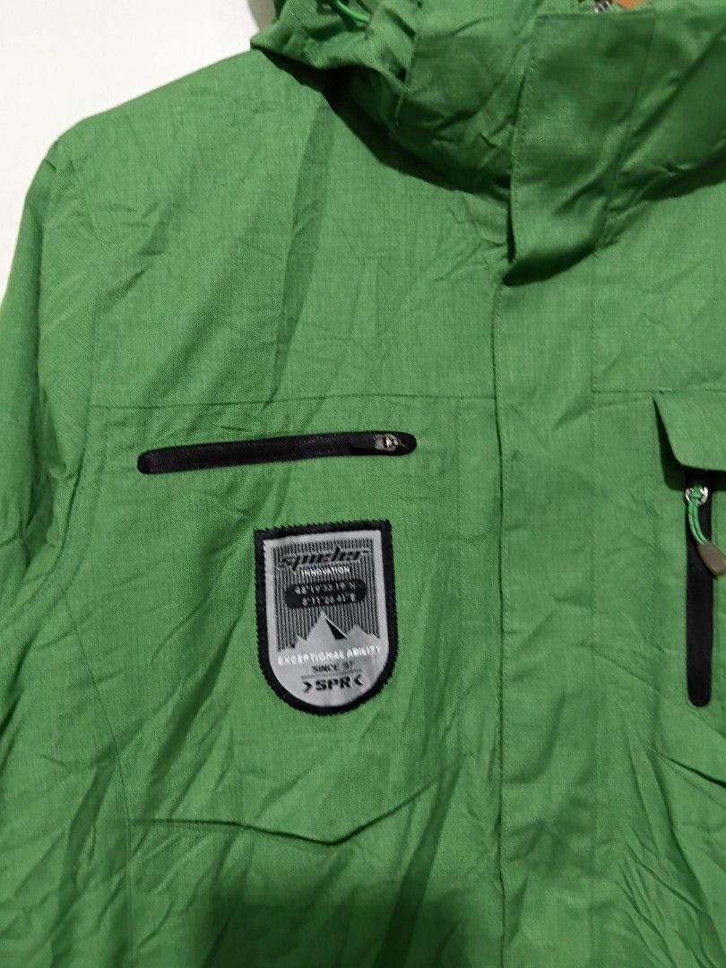 Spieler Green Jacket Exceptional Ability SPRK (Category: Coats, Jackets and Outerwear) located in Valencia. Submitted by cabisaythriftshop (Listing ID 1461080639, Image 2). Description: - Spieler green jacket - Size: 95 / L - 'Exceptional Ability SPRK' patch - Multiple front zip pockets - Hooded design - Ideal for outdoor activities Spieler Outdoor Med-Large 26L*21.5W As new .