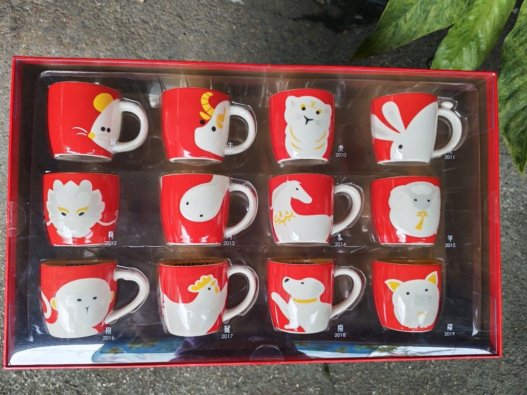 Starbucks Zodiac Collection Mugs (Category: Coffee & Tea Tableware) located in Quezon City. Submitted by danilo.danilo4 (Listing ID 1460934876, Image 1). Description: - Set of 12 Starbucks Zodiac Mugs - Each mug represents a zodiac animal and its corresponding year - Comes in a beautiful red gift box - Ideal for collectors or as a unique and thoughtful gift - Part of the exclusive Starbucks zodiac collection 700 per pc also available 1set .