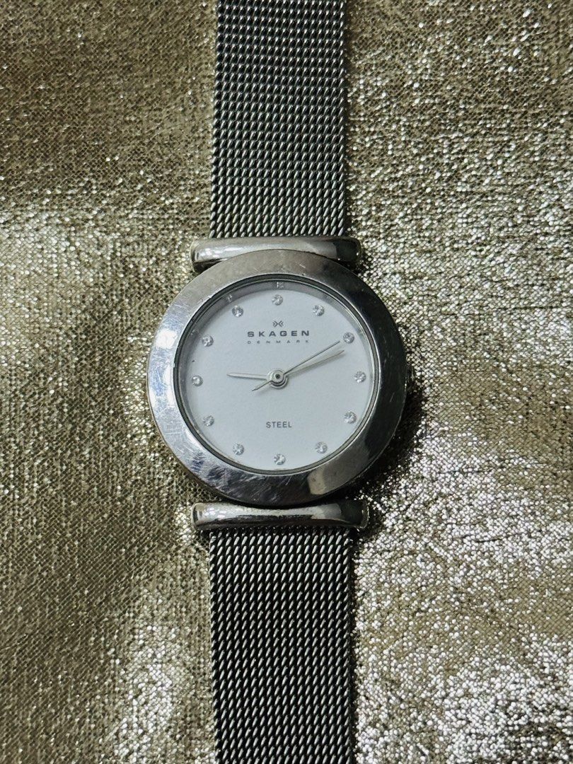 Steel Mesh Strap Watch (Category: Women's Watches) located in Bacolod City. Submitted by vintage_vogue6100 (Listing ID 1461011839, Image 1). Description: - Dial Color: White - Strap: Silver Mesh - Markers: Crystal Hour Markers - Water Resistance: 3 ATM - Crystal: Mineral Crystal - Case Material: Stainless Steel - Model Number: 107SSSD.