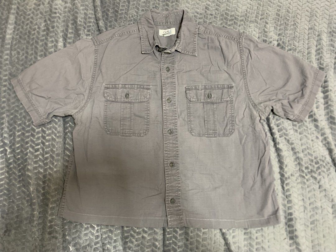 STONE GREY BOXY CROP POLO (Category: Tshirts & Polo Shirts ) located in Bacolor. Submitted by mllrigwy (Listing ID 1461007564, Image 1). Description: STONE GREY BOXY CROP POLO ₱249 + sf Length 21 inch Waist/Width 21 inch Mop: gcash only! Unisex Small on tag Loc: Pampanga Small issue on the last slide Payment First! Fixed price .