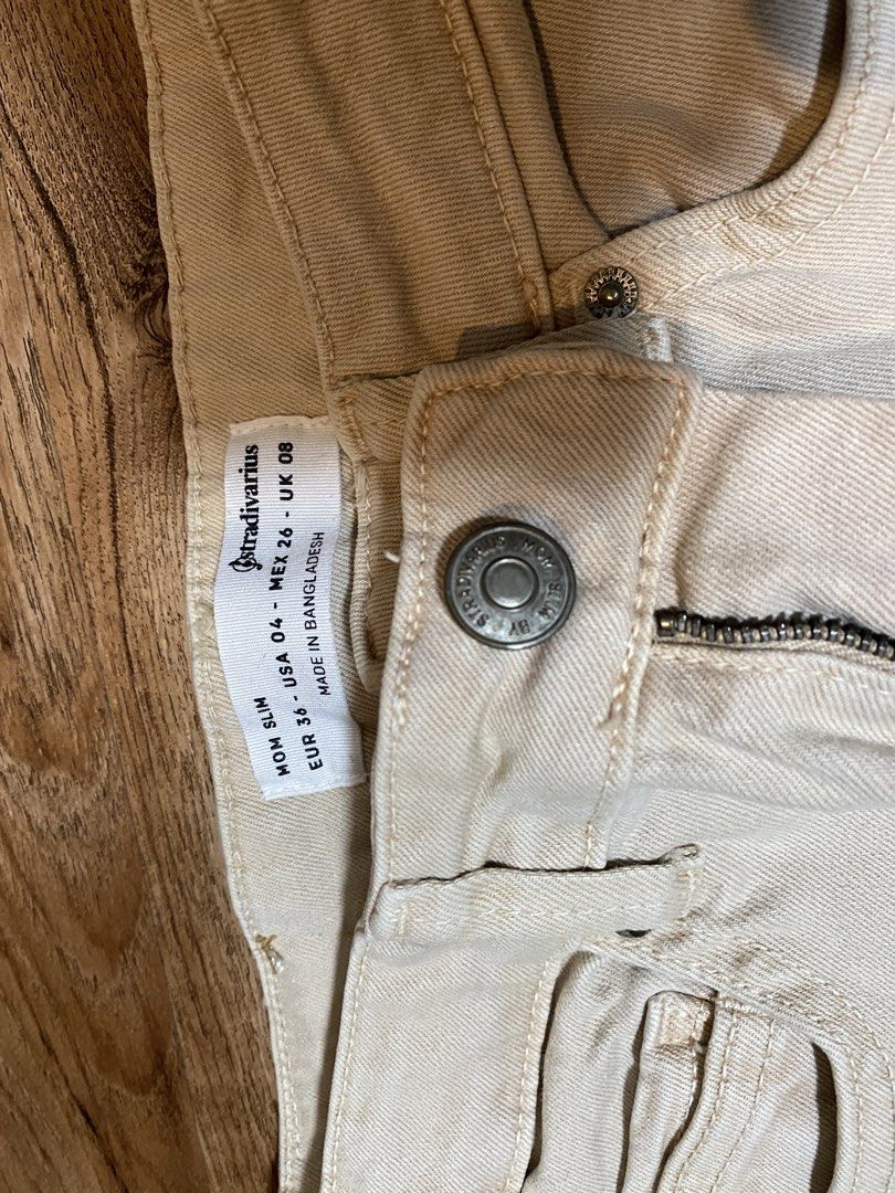 Stradivarius Mom Slim Jeans Beige (Category: Jeans) located in Bulacan. Submitted by beeucarat05 (Listing ID 1461111646, Image 3). Description: - Brand: Stradivarius - Style: Mom Slim Jeans - Color: Beige - Size: EUR 36 / UK 8 / US 04 - Origin: Made in Bangladesh - Features: Classic five-pocket style, button and zip closure - size 24 -25 - semi stretch denim - used 1-2x only Rfs: not my style.