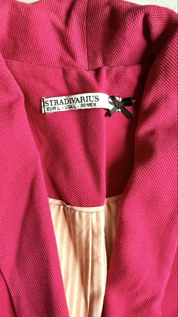 Stradivarius Pink Blazer (Category: Coats, Jackets and Outerwear) located in General Santos City (Dadiangas). Submitted by ssssshhhhhhhhh (Listing ID 1460949559, Image 3). Description: - Bright pink blazer from Stradivarius - Size L - Gold zipper details on pockets - Single button closure - Subtle stripe pattern on inner lining - Ideal for dressing up outfits.