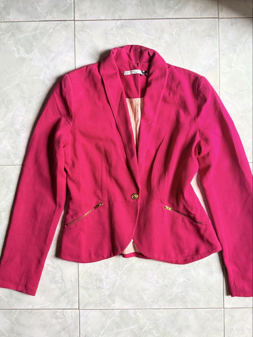 Stradivarius Pink Blazer (Category: Coats, Jackets and Outerwear) located in General Santos City (Dadiangas). Submitted by ssssshhhhhhhhh (Listing ID 1460949559, Image 1). Description: - Bright pink blazer from Stradivarius - Size L - Gold zipper details on pockets - Single button closure - Subtle stripe pattern on inner lining - Ideal for dressing up outfits.