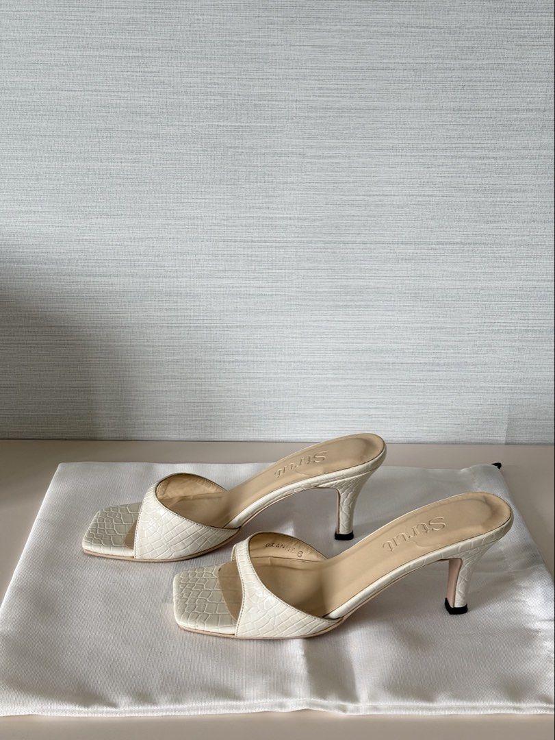 Strut White Croc Square Toe Heeled Mules (Category: Heels) located in Tarlac. Submitted by samdeclutters_ (Listing ID 1460964006, Image 3). Description: - Size: 6 - Color: White Croc - Heel height: 3 inches - Used 2-3x - Feel free to ask for more pics! .
