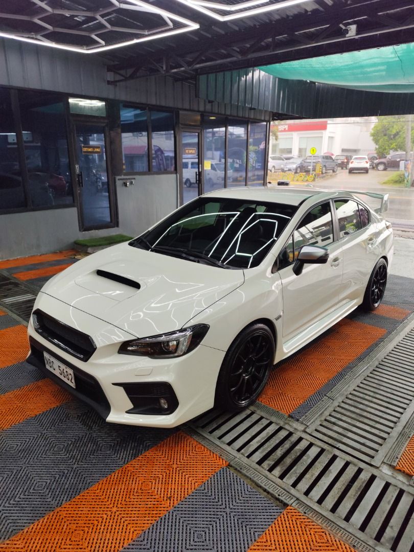 Subaru WRX 2.0 AWD CVT (A) (Category: Used Cars) located in Caloocan City. Submitted by flkennedy (Listing ID 1461087534, Image 2). Description: For sale! 2018 SUBARU WRX Eyesight Automatic Transmission +/- 2x,xxx Odometer Only All Original Paint Complete 2 keys Manuals / Booklet Newly Full PMS (Group N) Worth 450,000 Upgrades (All Orig) Brandnew 19's ZE40 Special Color Brandnew Hankook Tires Tomei Extreme Titanium Full Exhaust NBR Carbon Fiber G