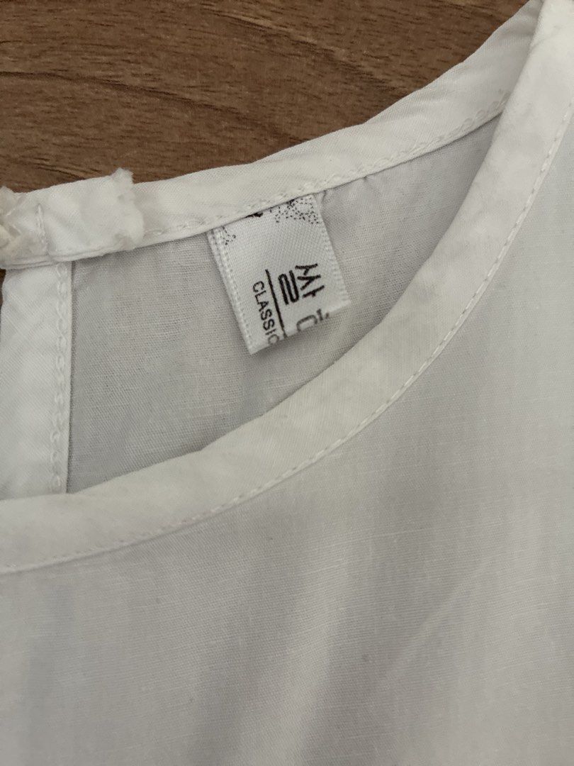 Summer sleevless top (Category: Blouses) located in Pasig City. Submitted by slr1949 (Listing ID 1460938308, Image 2). Description: White top with ruffles on the bottom.