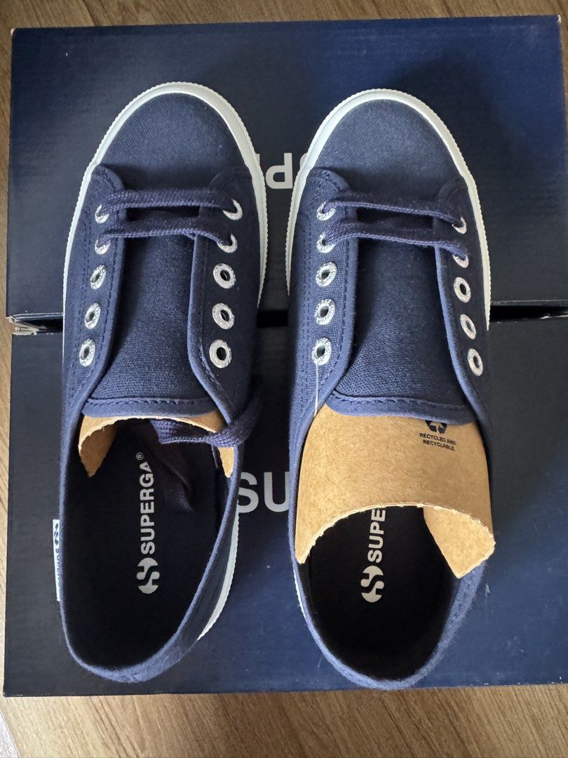 Superga Navy Blue Canvas Sneakers (Category: Sneakers) located in Taguig. Submitted by misstangerine (Listing ID 1460935016, Image 1). Description: - Classic Superga navy blue canvas sneakers - Model: 2750 Cotu Classic - Style: Lace-up with white rubber soles - Color: Navy Blue - Size: 38 - Condition: Comfortable and versatile for everyday wear - Includes: Original box and tags.