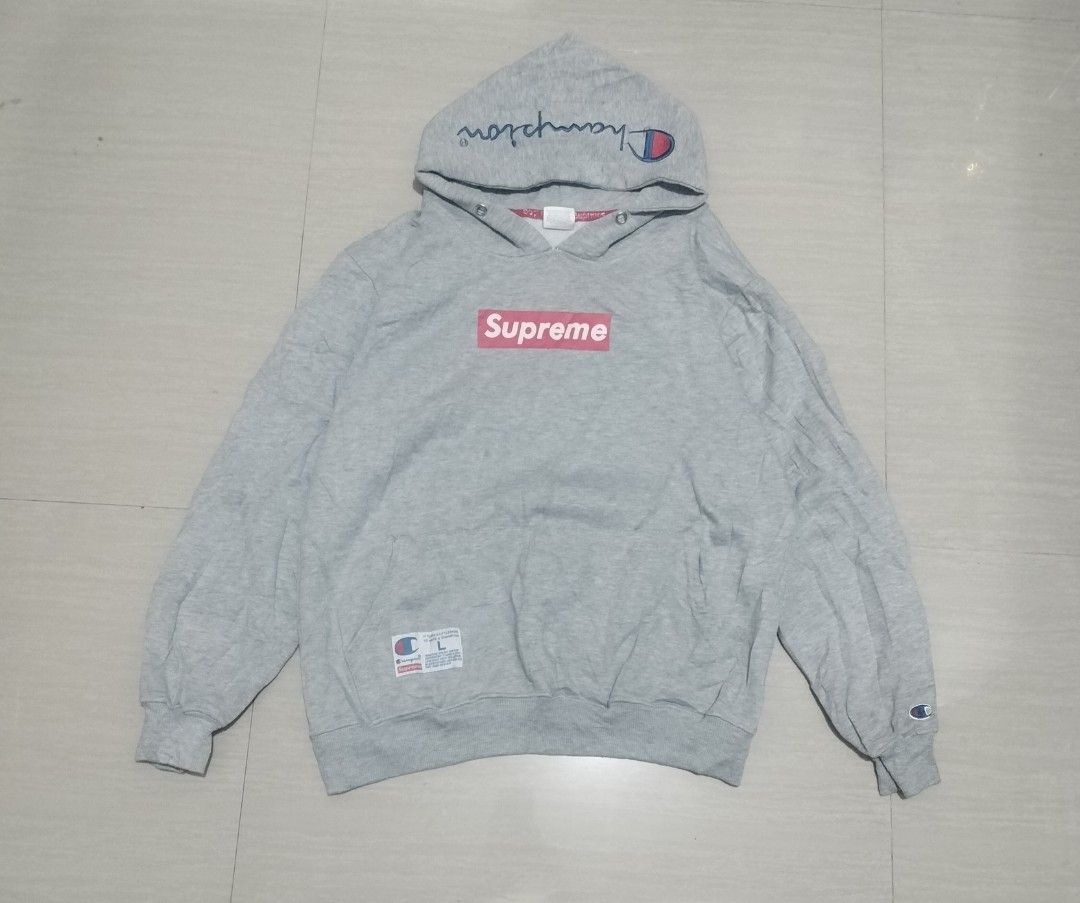 SUPREME X CHAMPION HOODIE (Category: Hoodies) located in Sariaya. Submitted by social_animalz (Listing ID 1461083255, Image 1). Description: 21 x 24 0ff needs washing sa hood and right sleeve, with cracks , missing drawstring shipping fee is not included.