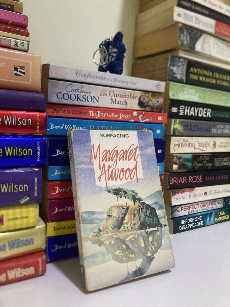 Surfacing by Margaret Atwood (Category: Storybooks) located in Manila. Submitted by kreserie (Listing ID 1461094445, Image 2). Description: ୨୧ ˚₊‧ NEW ARRIVAL! ‧₊˚ ୨୧ - Paperback edition of Margaret Atwood's Surfacing. - Pages show yellowing due to age. - Visible water stains on some inside pages. - Spine exhibits signs of wear. - A classic novel, perfect for book enthusiasts. - Feel free to PM for conditions 🌷 Condition: Very Good — minimal usa