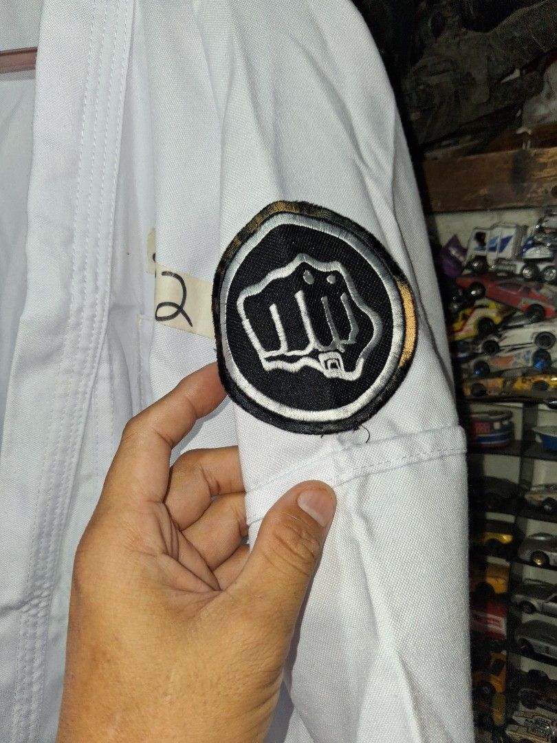 Taekwondo uniform size 27x32inch (Category: Combat Sports) located in Manila. Submitted by marcas022798212 (Listing ID 1460989077, Image 2). Description: .