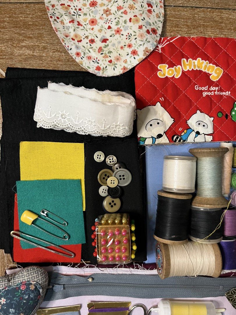 Take All Assorted Sewing Notions, Threads, Fabrics, and Accessories (Category: Craft Supplies & Tools) located in Gapan. Submitted by lunashop14 (Listing ID 1461069941, Image 2). Description: - Assorted threads in various colors - Collection of buttons - Sewing needles - Safety pins - Fabric scraps - Cute quilted patches - Decorative trims - Ideal for crafting and mending - All items pictured are included.