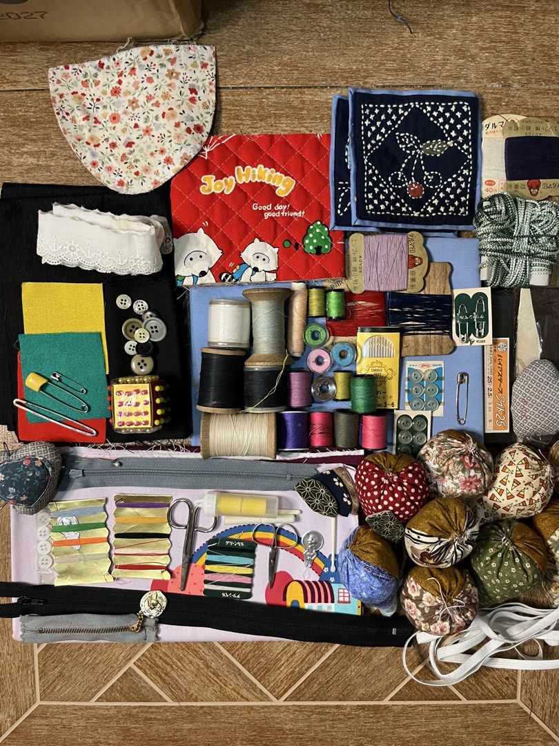 Take All Assorted Sewing Notions, Threads, Fabrics, and Accessories (Category: Craft Supplies & Tools) located in Gapan. Submitted by lunashop14 (Listing ID 1461069941, Image 1). Description: - Assorted threads in various colors - Collection of buttons - Sewing needles - Safety pins - Fabric scraps - Cute quilted patches - Decorative trims - Ideal for crafting and mending - All items pictured are included.