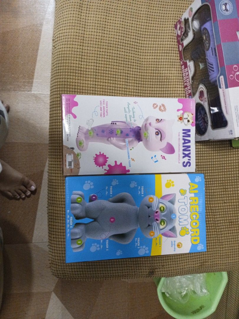 Talking Tom & talking Angela set for only 800php (Category: Interactive Toys) located in Tanza. Submitted by --unicorn-- (Listing ID 1461032272, Image 2). Description: - Two talking cat toys: AI Touch Tom and Manx's. - Both come in their original boxes. - Perfect for kids who love cats. - Features: Repeats what you say and has touch-activated functions. - Provides fun, interactive playtime..
