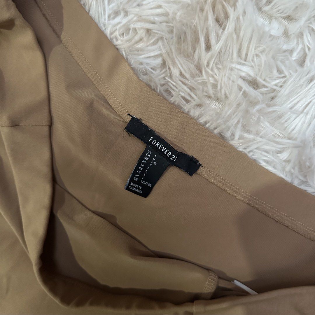 Tan Maxi Skirt (Category: Skirts) located in Cainta. Submitted by tooonico (Listing ID 1461025909, Image 3). Description: RFS: Not my size anymore MOP: GCash/Maya/Maribank/UB .