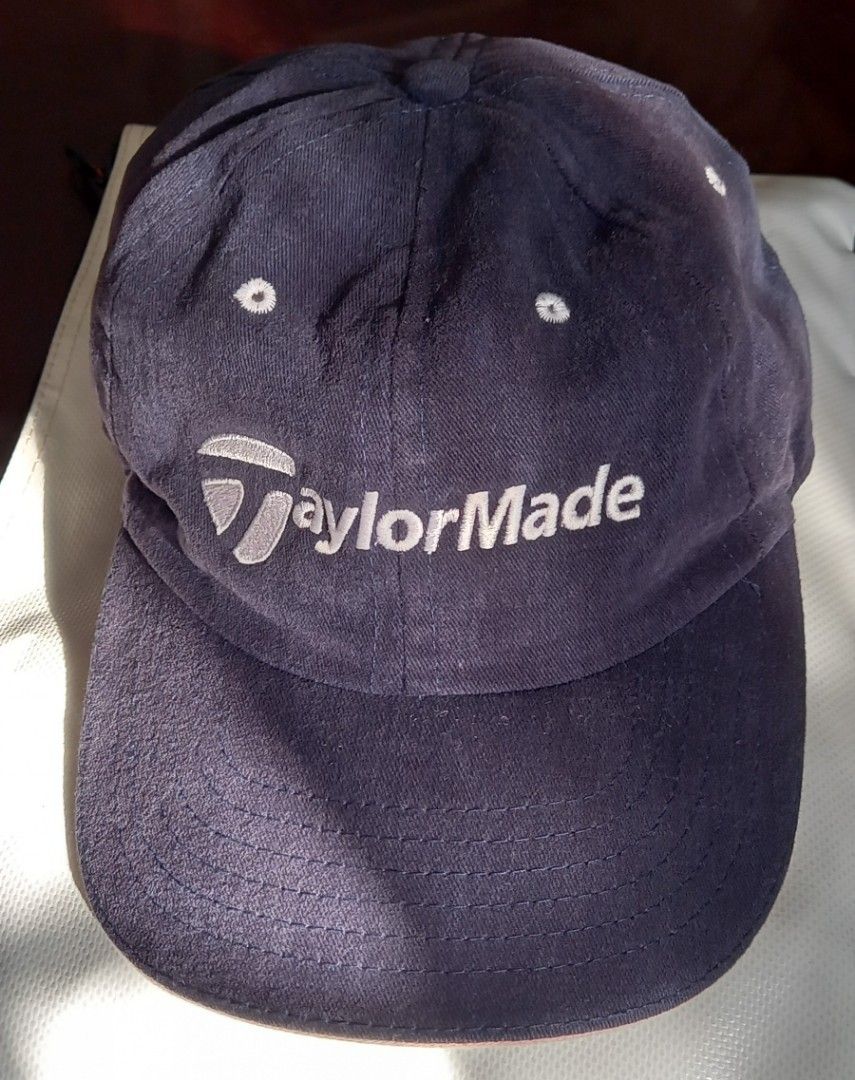 TaylorMade Golf Cap Navy Blue (Category: Caps & Hats) located in Cagayan de Oro. Submitted by edwardryan01984 (Listing ID 1461114490, Image 1). Description: - Navy blue TaylorMade golf cap - Adjustable strap for a custom fit - Embroidered TaylorMade logo on the front - Ideal for sunny days on the golf course - Versatile for casual everyday wear - Classic and simple design.