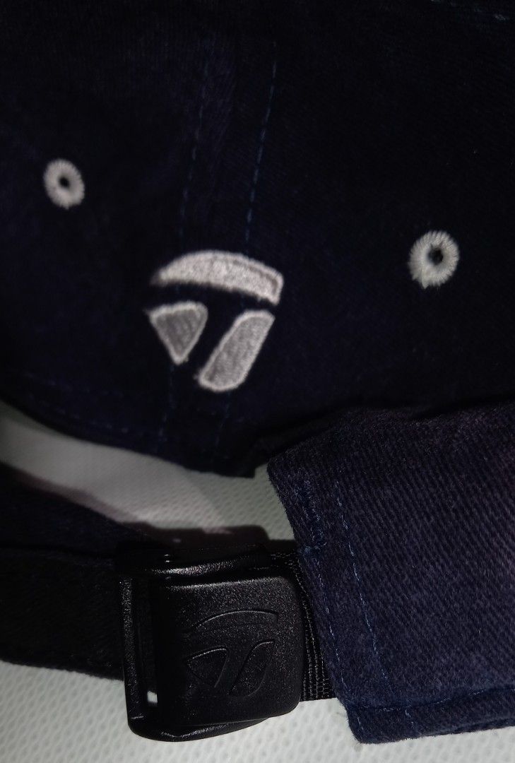 TaylorMade Golf Cap Navy Blue (Category: Caps & Hats) located in Cagayan de Oro. Submitted by edwardryan01984 (Listing ID 1461114490, Image 3). Description: - Navy blue TaylorMade golf cap - Adjustable strap for a custom fit - Embroidered TaylorMade logo on the front - Ideal for sunny days on the golf course - Versatile for casual everyday wear - Classic and simple design.