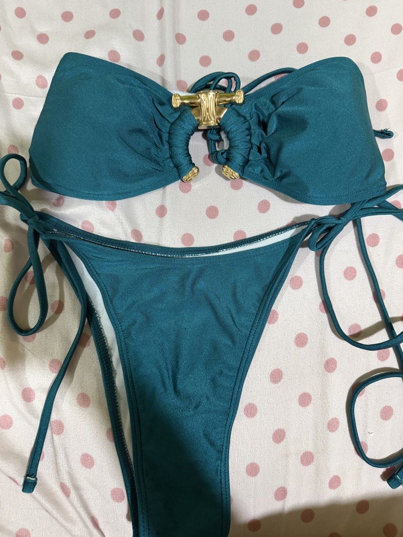 Teal Blue Bandeau 2-Piece Bikini Set 💙✨ (Category: Bikinis & Swimsuits) located in Manila. Submitted by klauuudette (Listing ID 1460992889, Image 1). Description: ✦ Worn once only ✦ Excellent condition ✦ No visible stains, holes, or major flaws ✦ Bandeau-style top with ruched detailing ✦ Gold-tone center accent ✦ Adjustable tie-string bikini bottoms ✦ Cute and flattering design ✦ Perfect for beach trips, pool days & vacations 🌊.